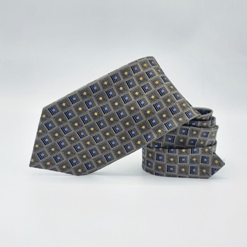 Detalhe do tecido da gravata verde escuro em seda Chas Reed Collection tradicional