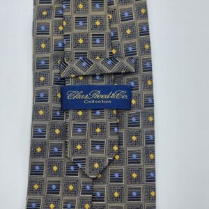 Verso da gravata verde escuro em seda com etiqueta original Chas Reed Collection