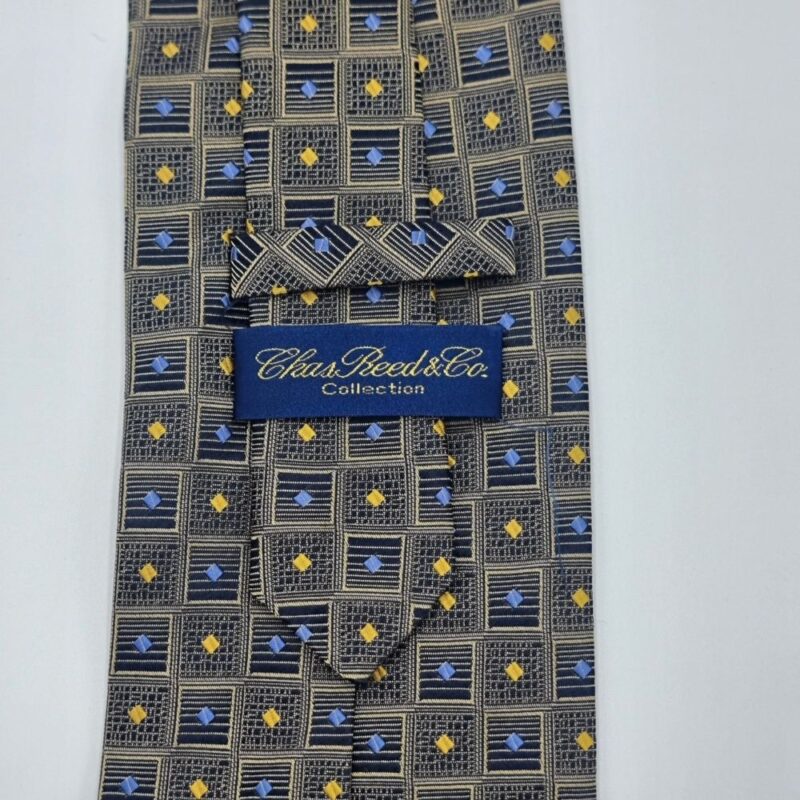 Verso da gravata verde escuro em seda com etiqueta original Chas Reed Collection