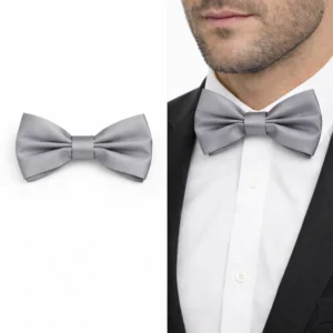 Gravata borboleta cinza usada no colarinho com camisa branca e terno preto